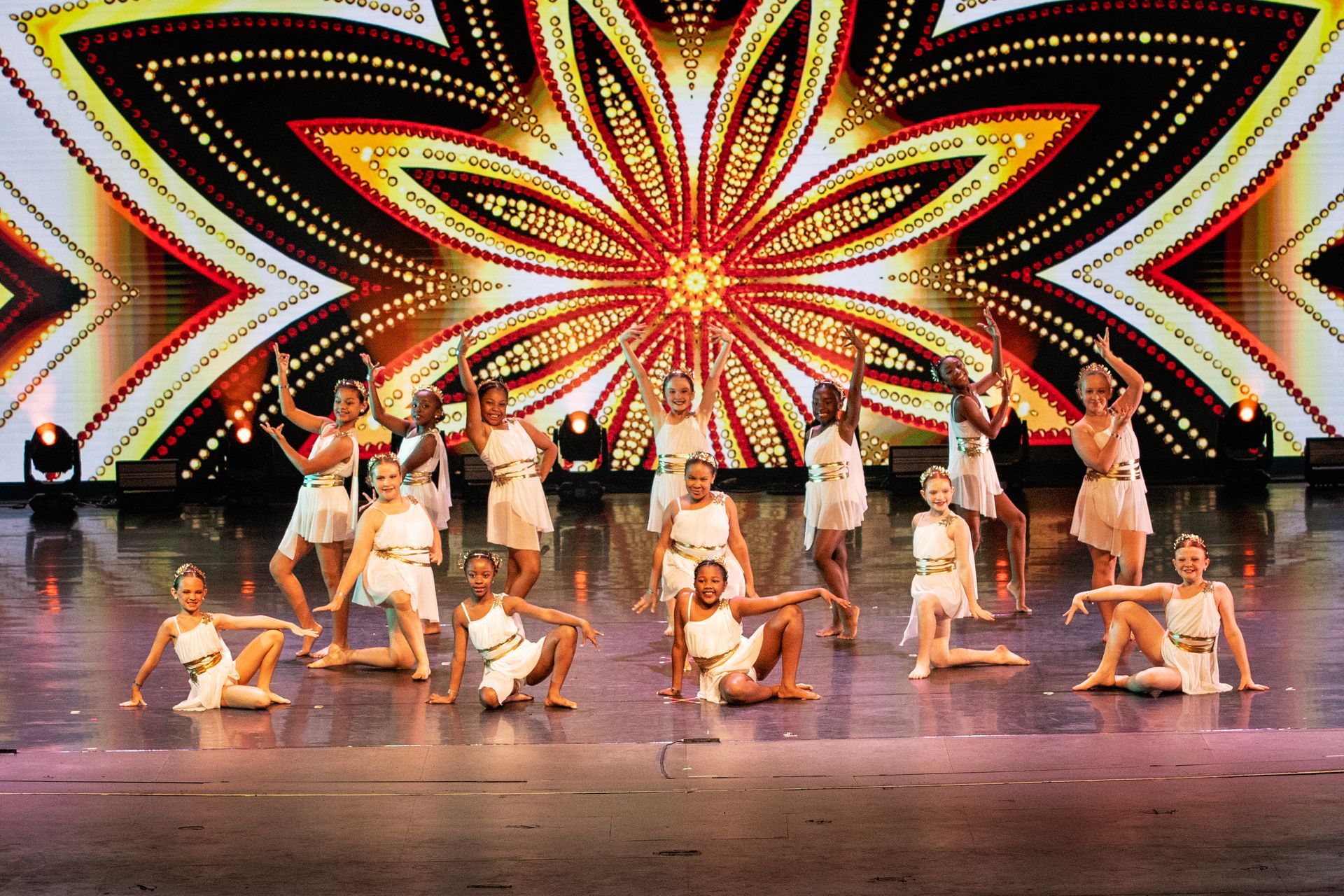 2025 dance showcase dancers posing in white