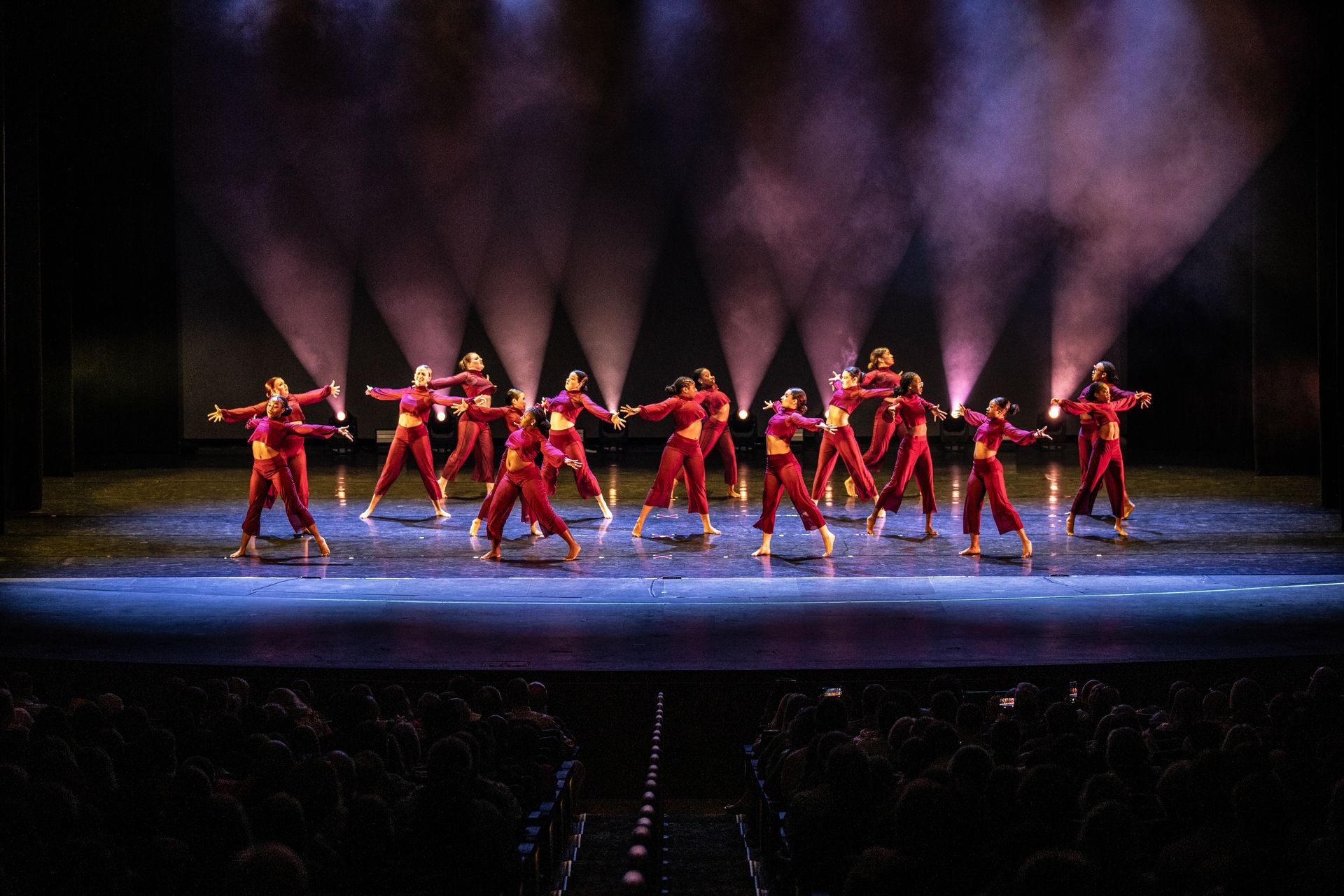 2025 dance showcase dancers in red costumes