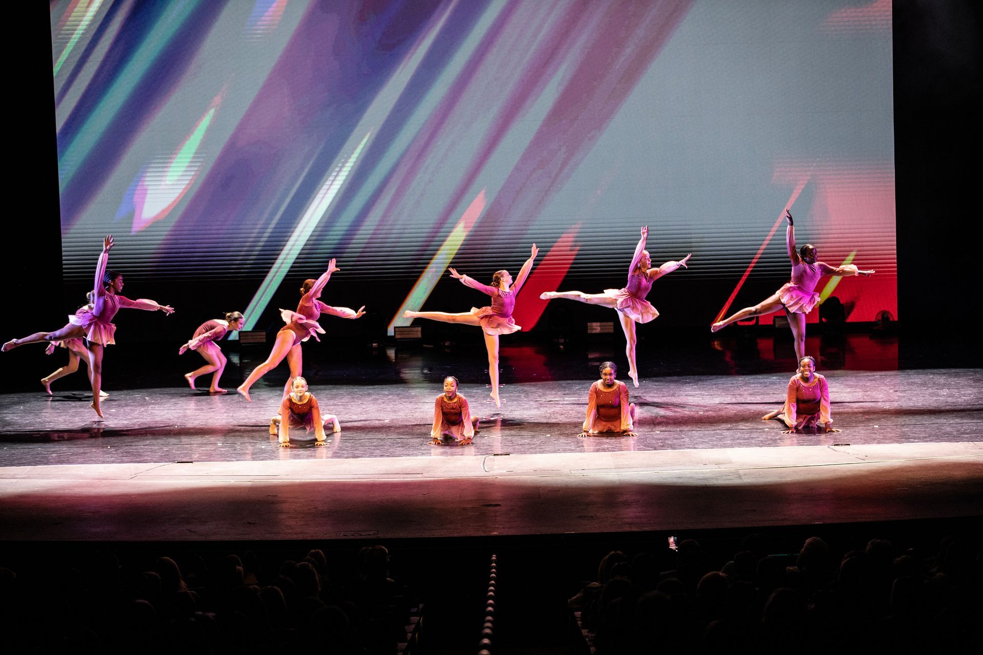 2025 dance showcase dancers in purple costumes