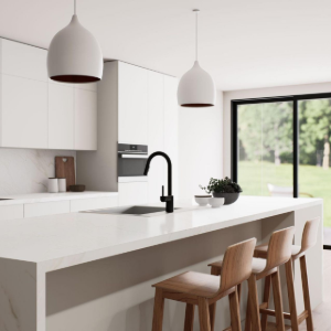 Modern white kitchen with island, pendant lights, wooden stools, and a large window overlooking greenery