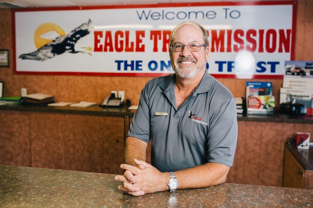 Man at our front desk smiling | Eagle Transmission & Auto Repair