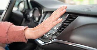 Hand feeling AC of car | Eagle Transmission & Auto Repair
