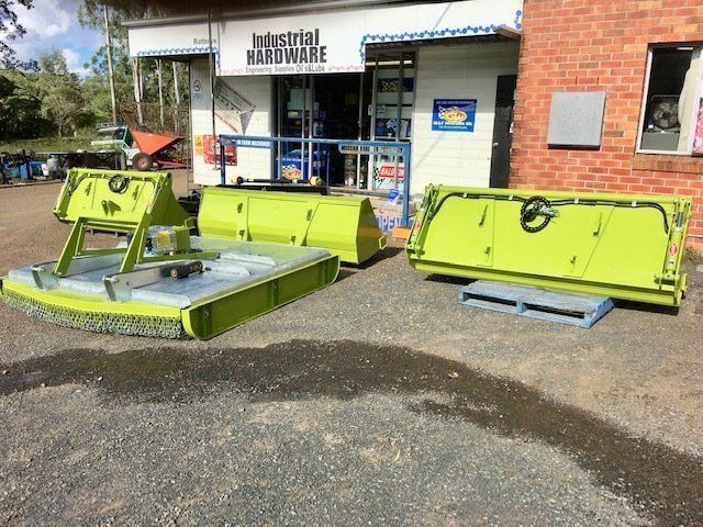 A Building With a Sign That Says Industrial Hardware — Wingham Farm Machinery in Wingham, NSW