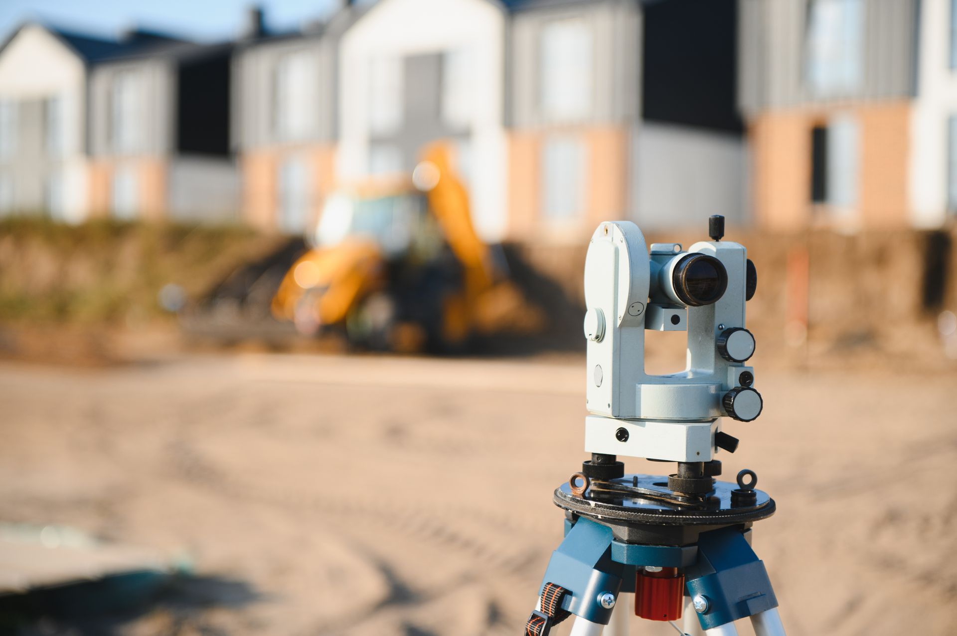 Surveying equipment at a residential construction.