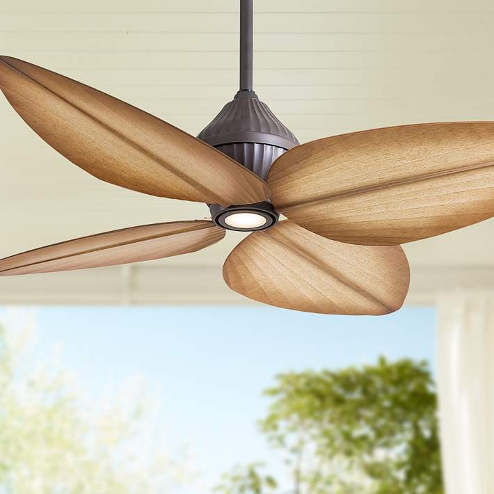 A close up of a tropical ceiling fan