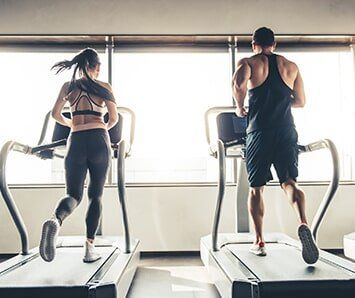 Man and Woman on Treadmill — Training in Columbia, SC