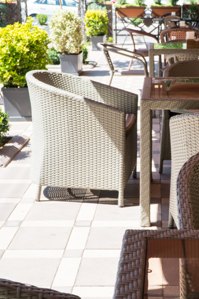 A photo of outside seating near a restaurant in Gilbert, AZ. The restaurant used SanTan Deck Designs to build the outdoor seating area.