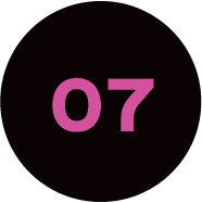 A pink number seven in a black circle on a white background.