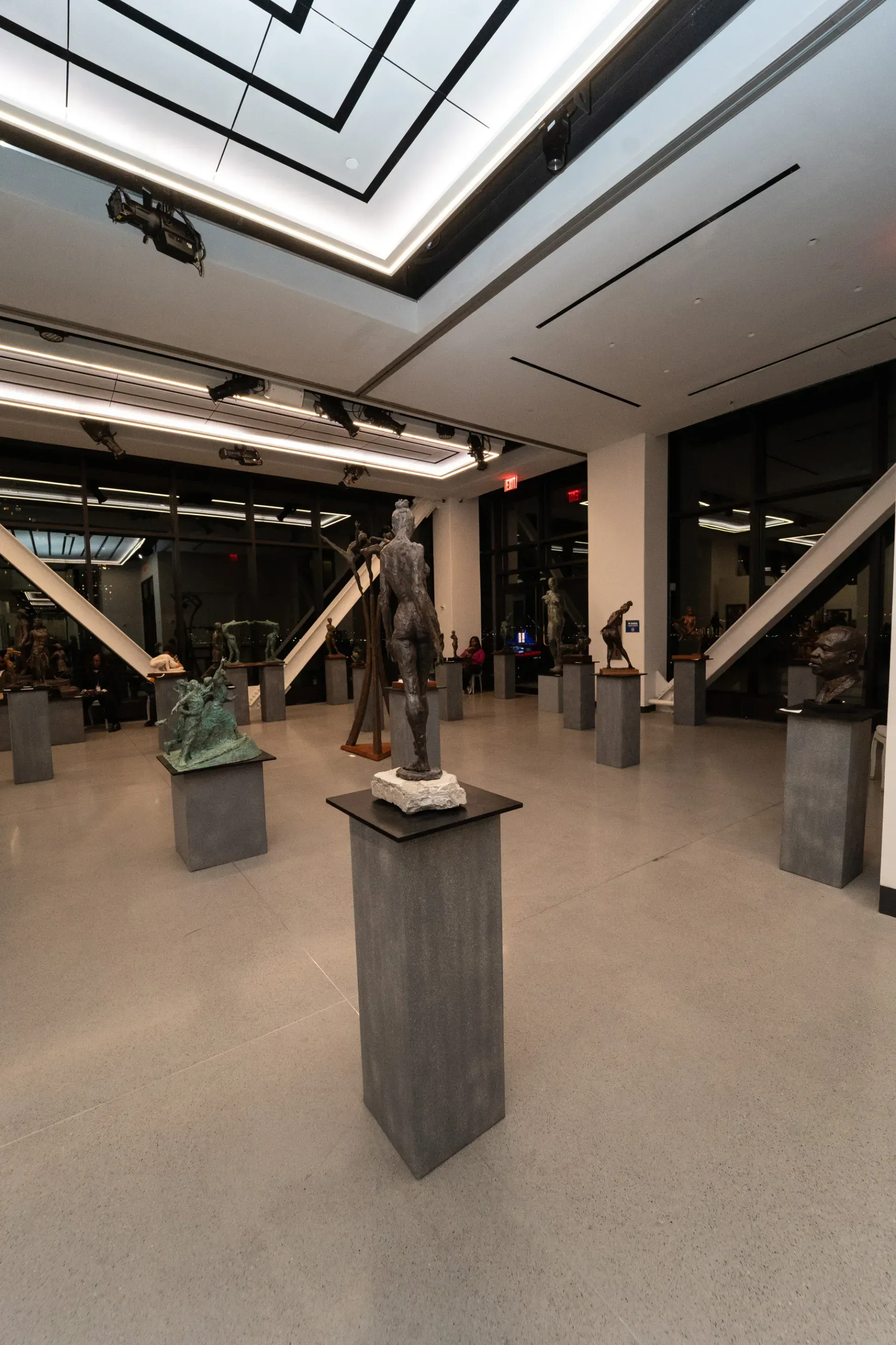 A large room with a lot of sculptures on display