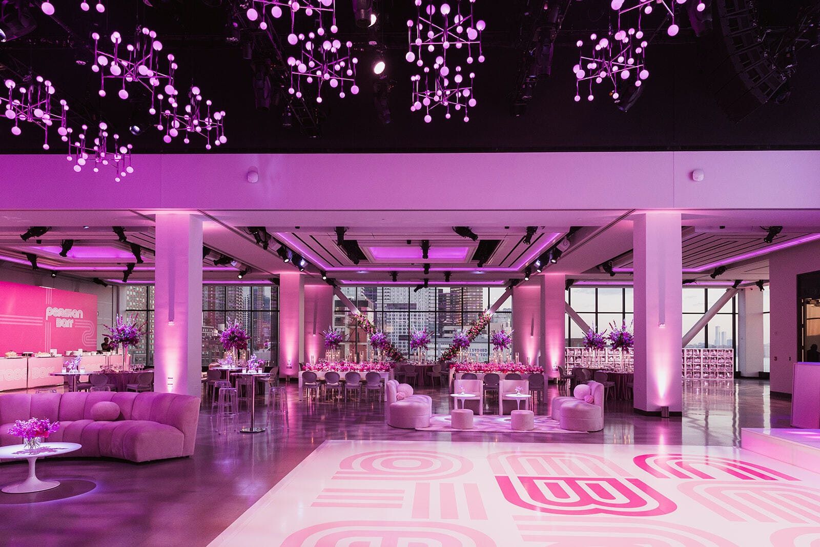 There is a dance floor in the middle of the room.