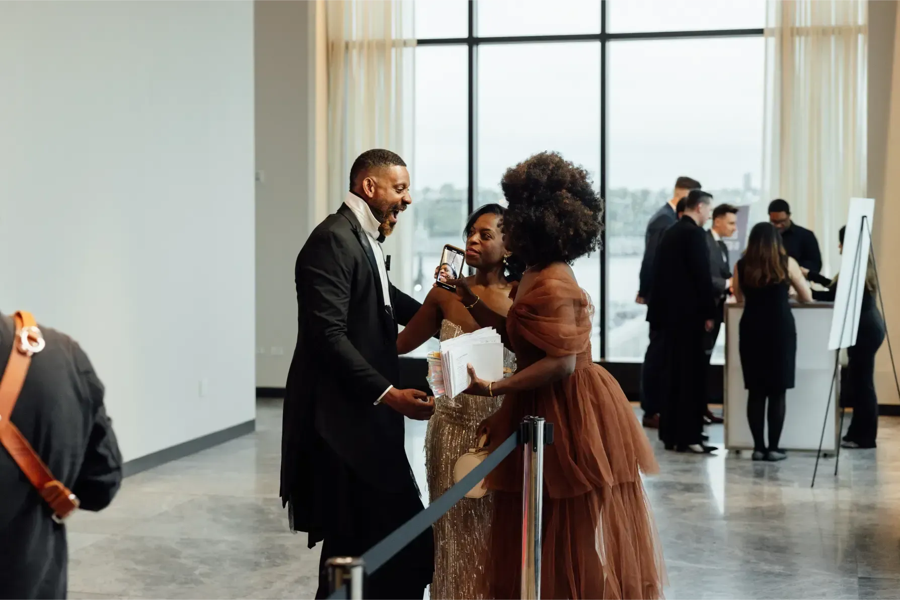 A man and a woman are standing next to each other in a room.