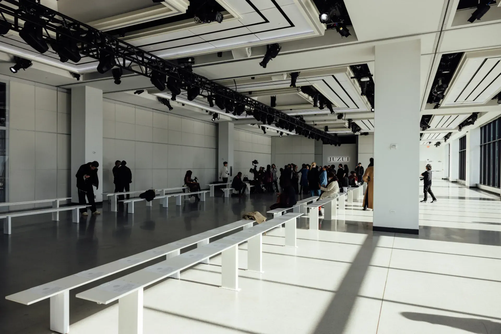 A large room with a lot of benches in it