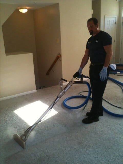 Man Using Vacuum - Area Rug Cleaning, Bathroom Cleaning