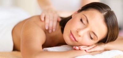 Massage Therapy — Woman in Spa Salon Getting Massage in Delray Beach, FL
