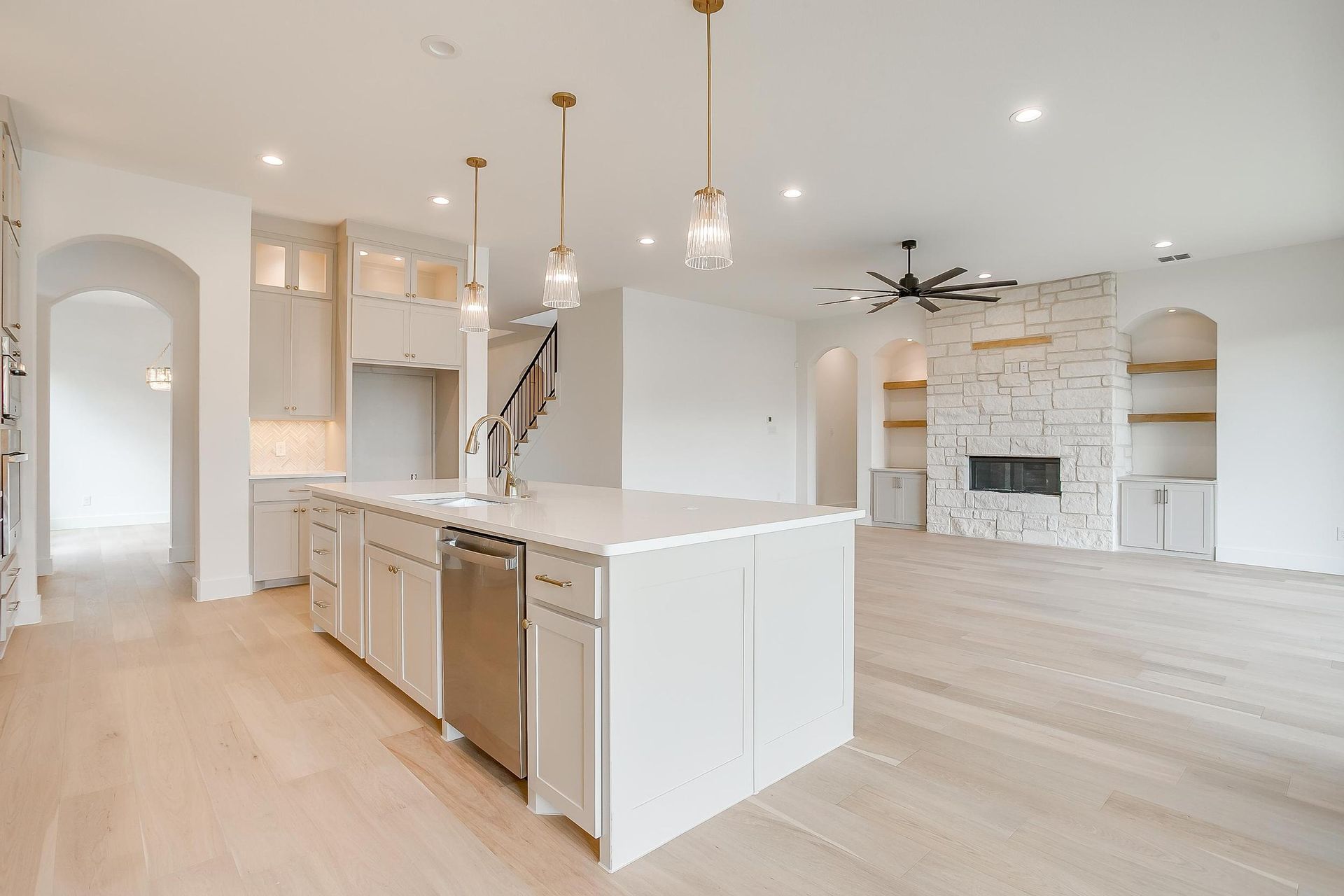 There is a large island in the middle of the kitchen.