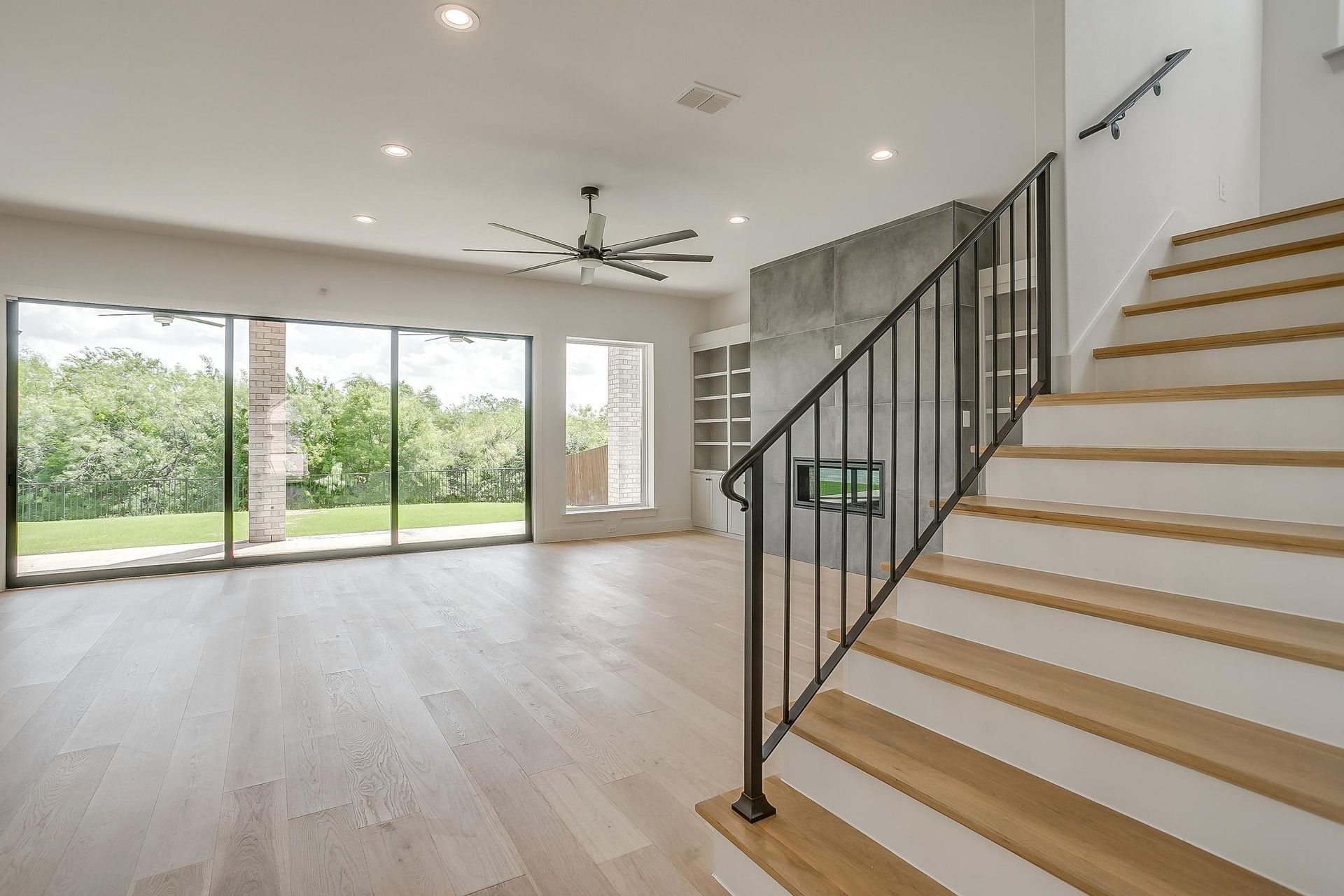 There is a staircase leading up to the second floor of a house.