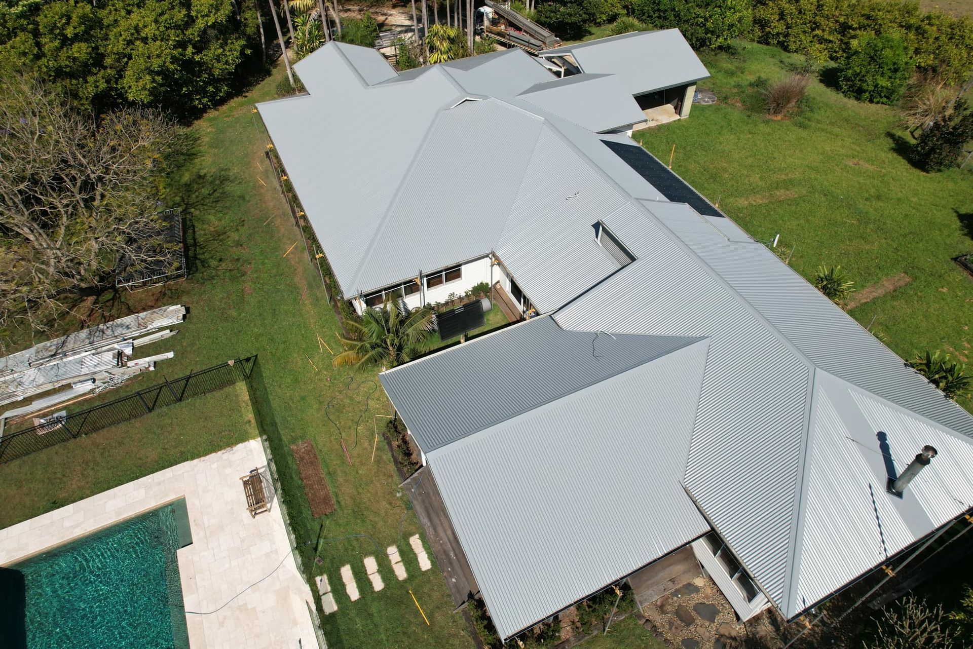 House with a Gray Metal Roofing — Expert Roofers in Lennox Head, NSW
