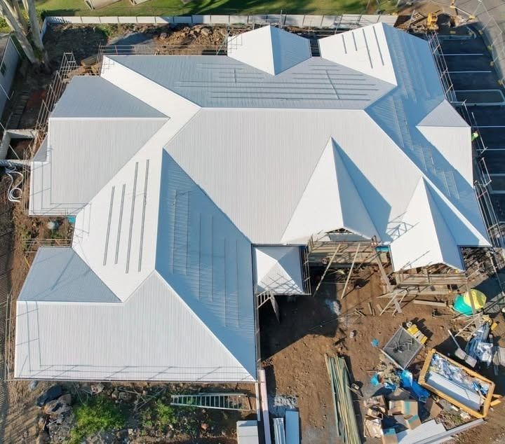 Aerial View of Complex Modern White Roof Structure