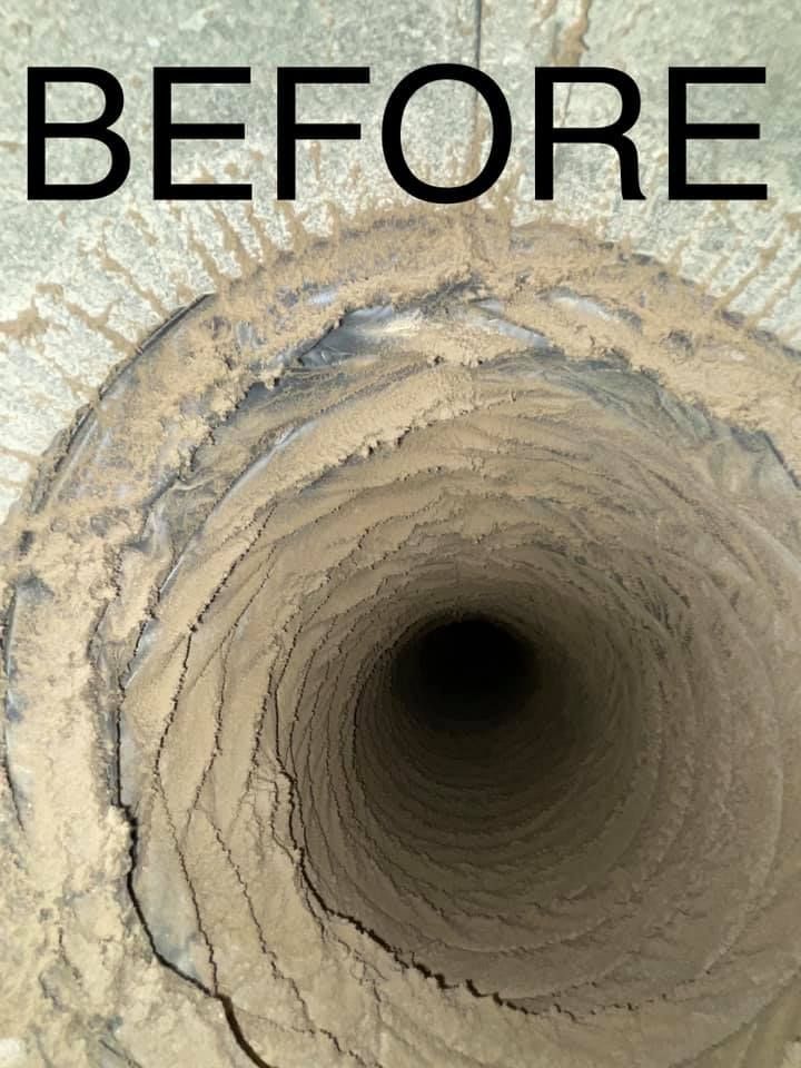 Dirty air duct interior, showing dust accumulation before cleaning.