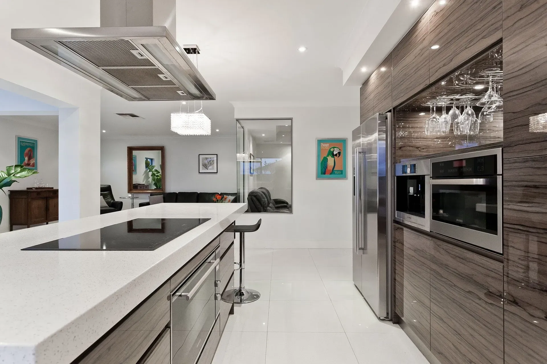 A kitchen with stainless steel appliances and wooden cabinets