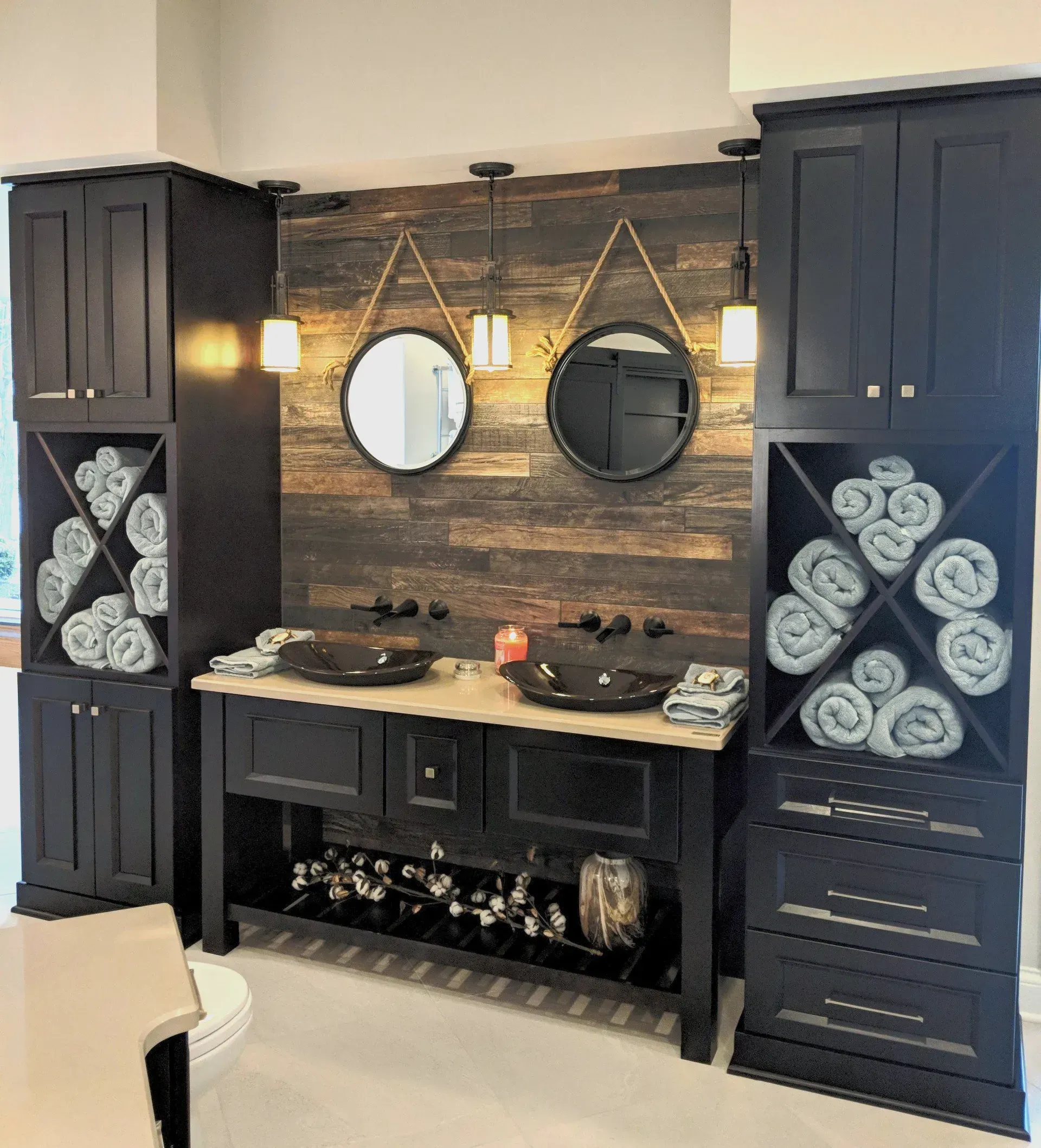 A bathroom with two sinks and two mirrors