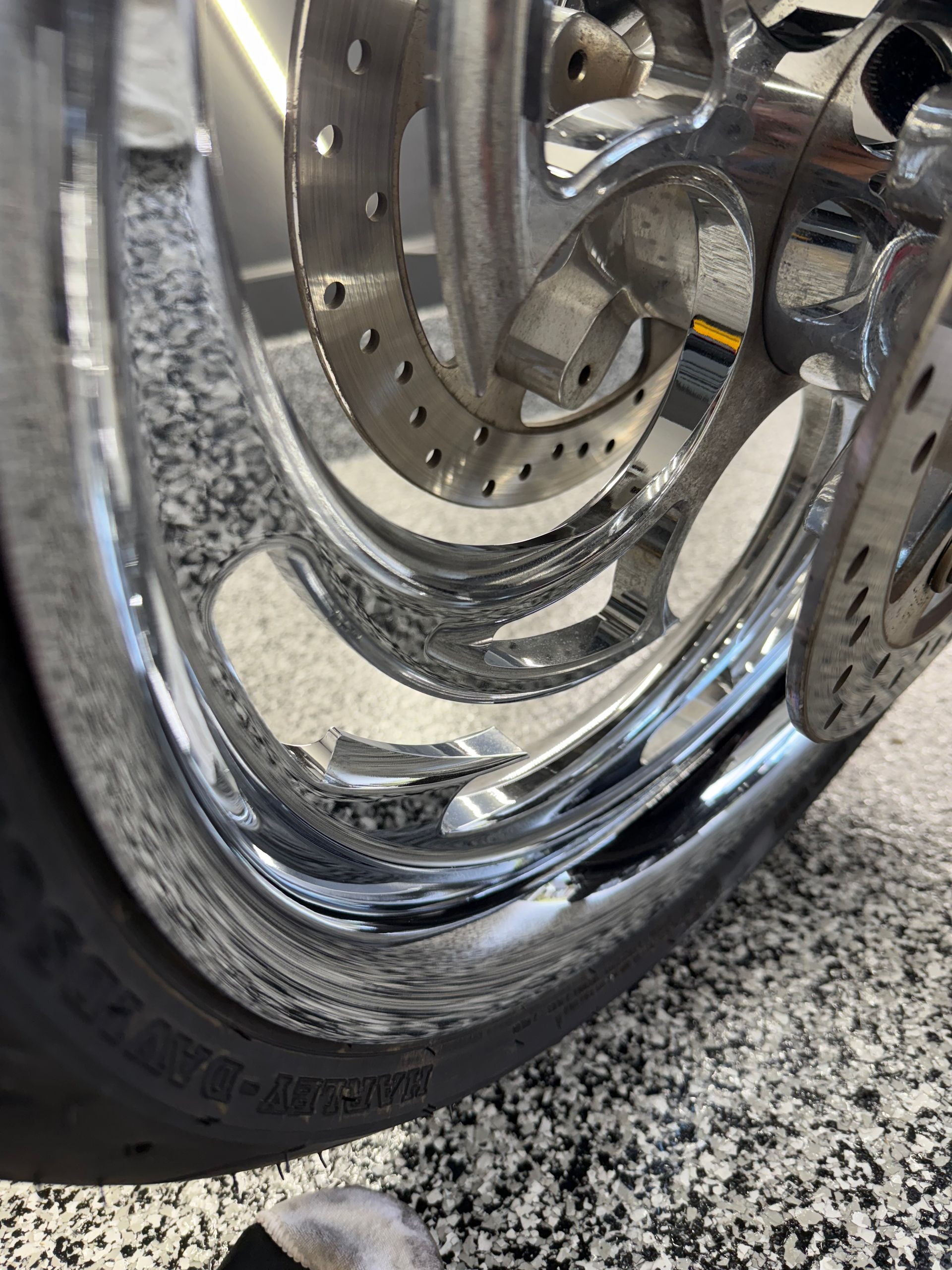 A jaguar f pace is parked in front of a house.