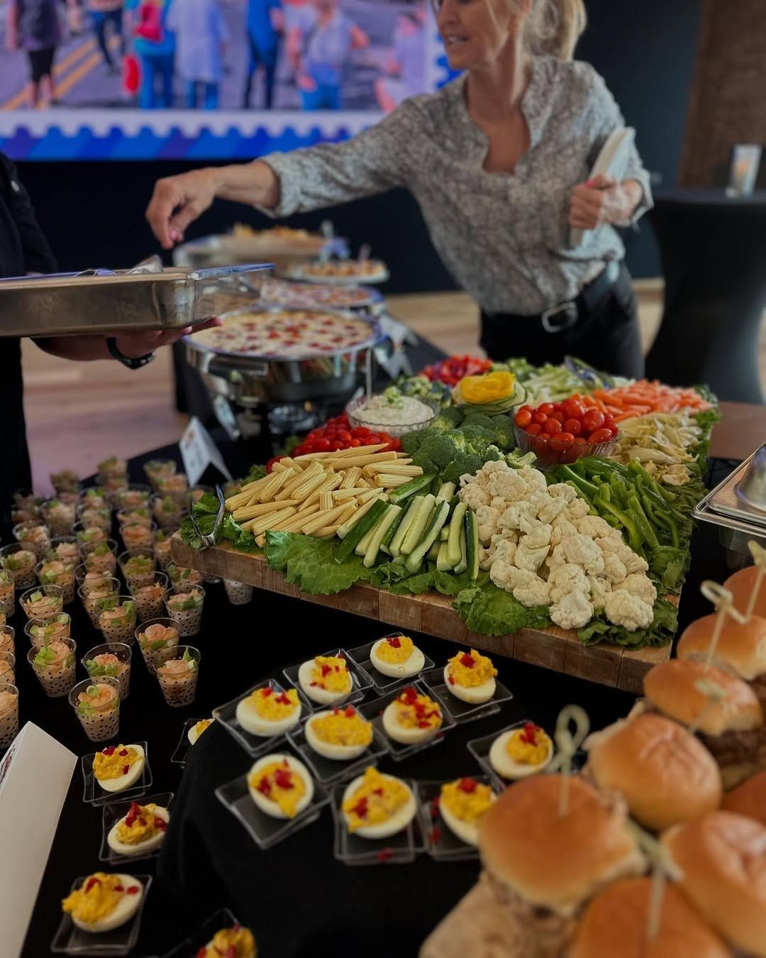 Serving food at a buffet table