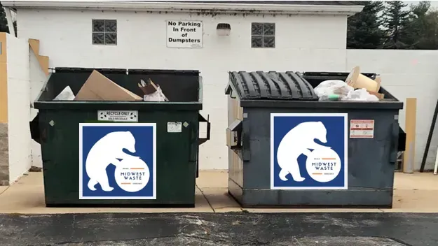 Two industrial trash dumpsters sitting side-by-side against a wall, each featuring a blue bear logo and waste service text.