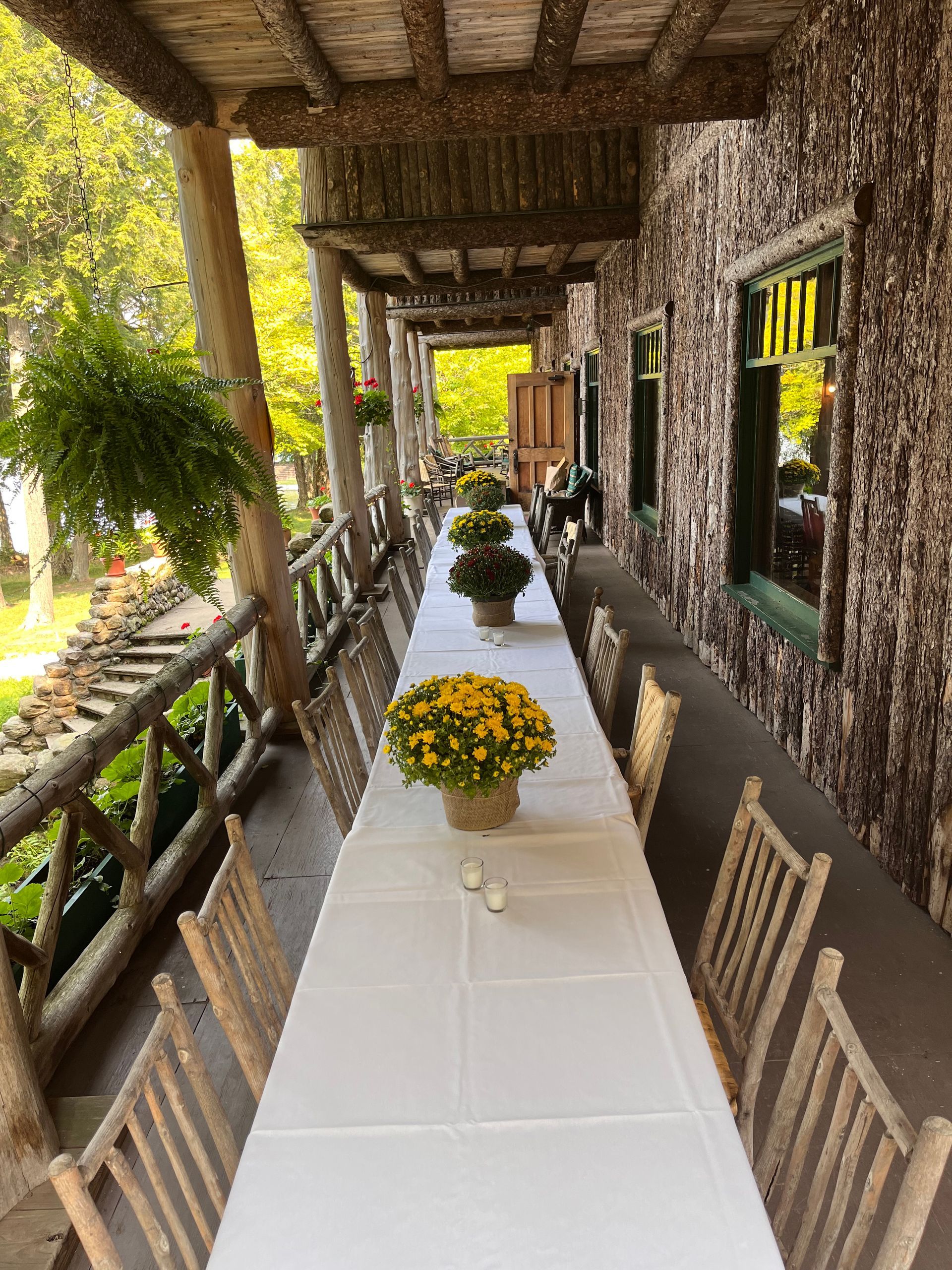 a long table with flowers on it