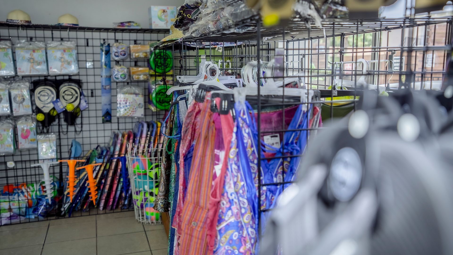 A store filled with lots of clothes and toys.