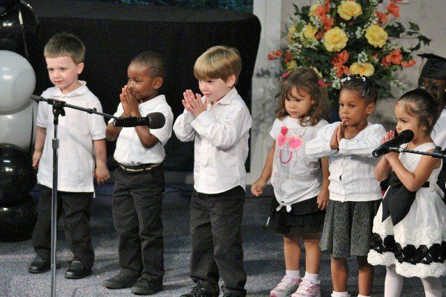Children saying their prayers in Chesapeake, VA