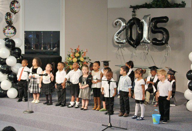 Children during graduation ceremony in Chesapeake, VA