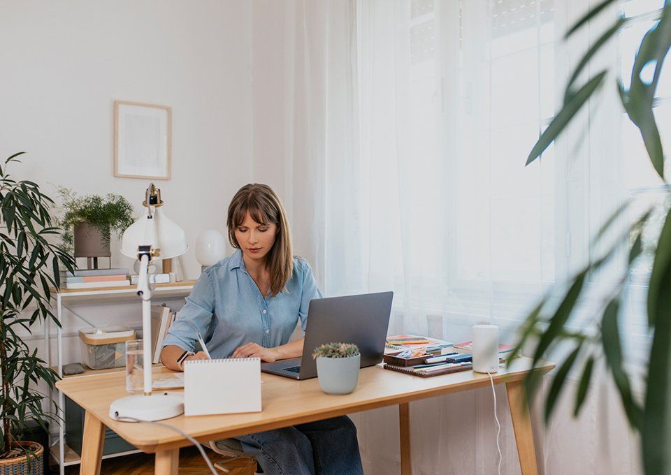 Woman Working In Her Home Office — Wichita, KS — Top Priority Concierge