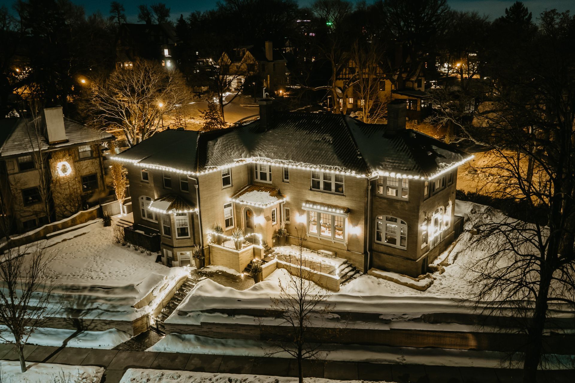 Holiday lights strung across a Minneapolis, MN front porch near Linden Hills