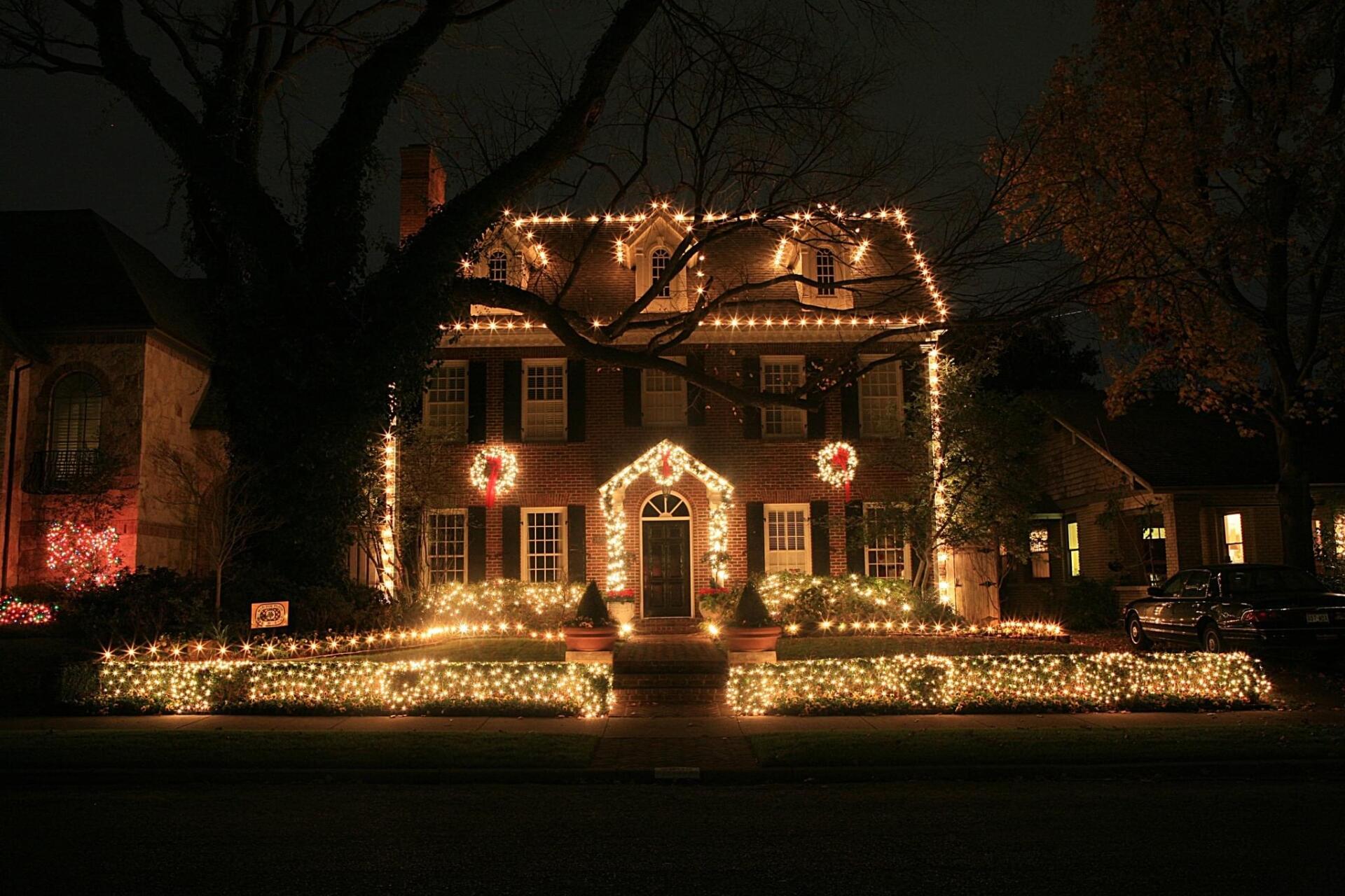Colorful Christmas lights outlining a classic Minneapolis bungalow in the Nokomis area