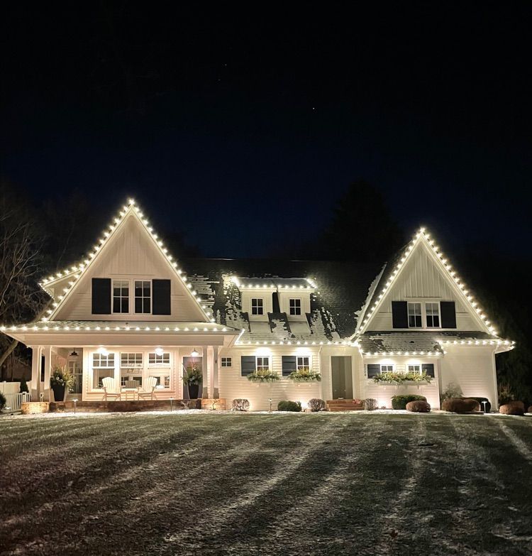 Tasteful Christmas lighting on a Minnetonka, MN home nestled in Sherwood Forest