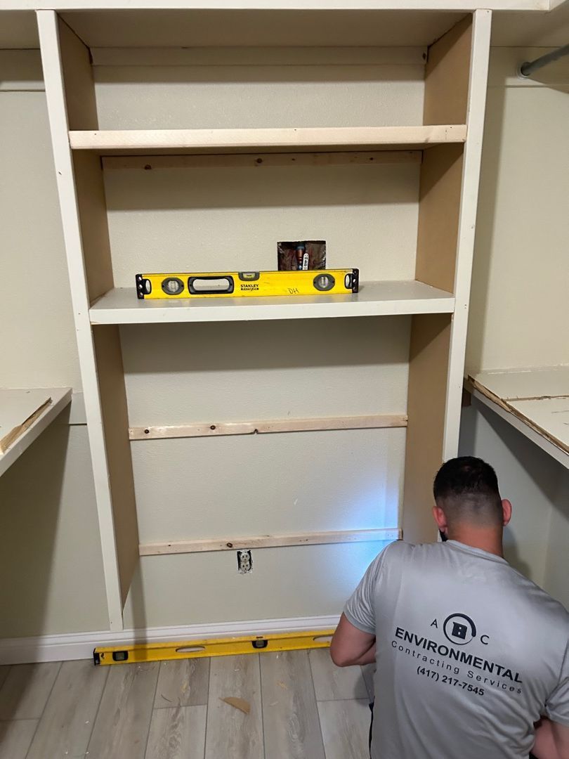 ABC Environmental team member working on closet reconstruction