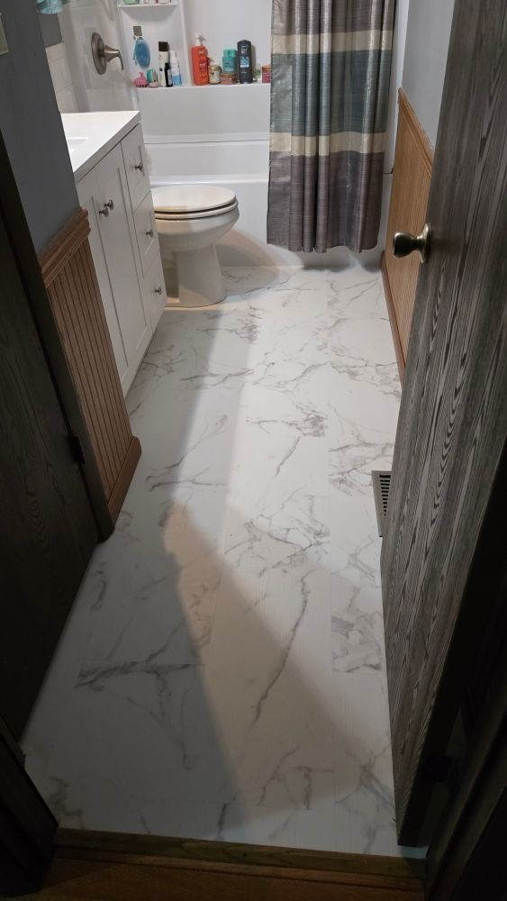 Completed new bathroom floor installation in Springfield home