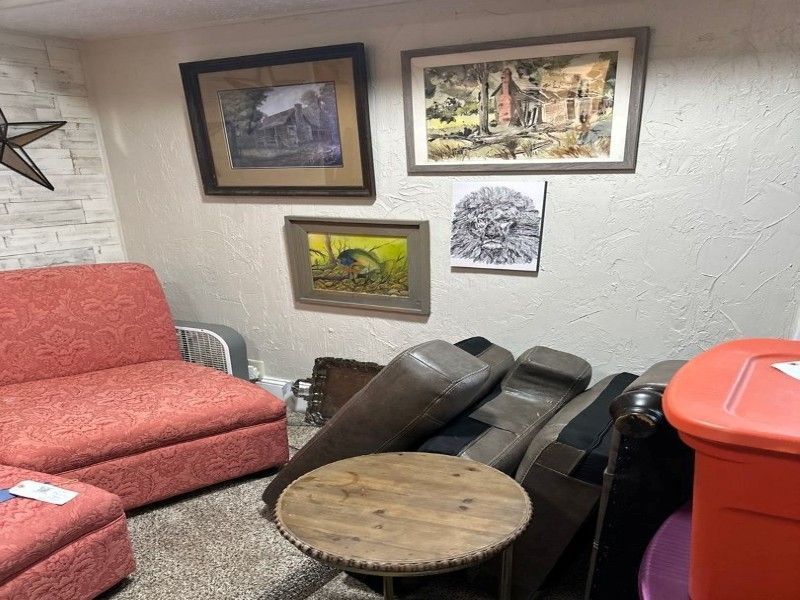 Clean furniture being returned to restored basement