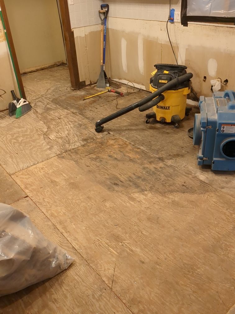 Industrial drying equipment placed in kitchen to address water damage