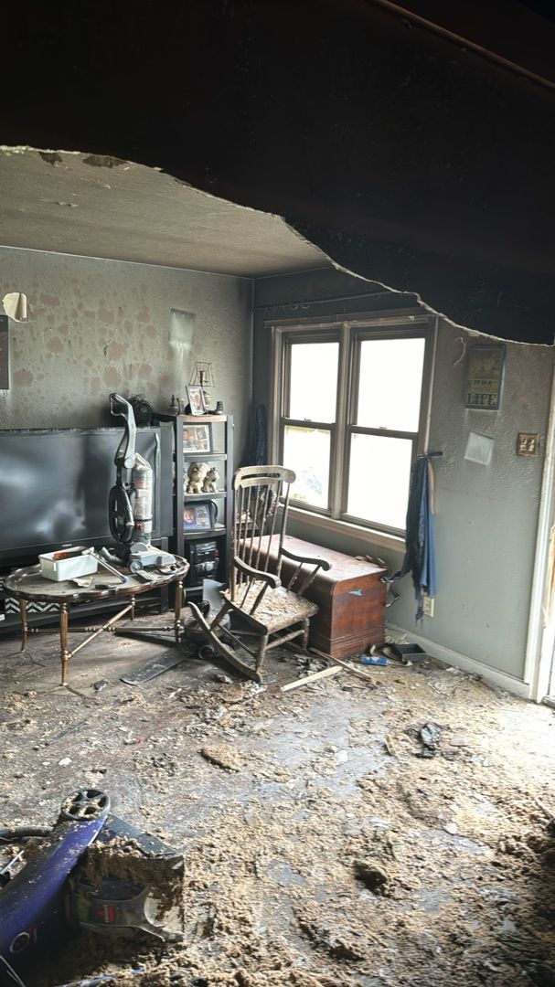 Fire damage restoration progress in living room