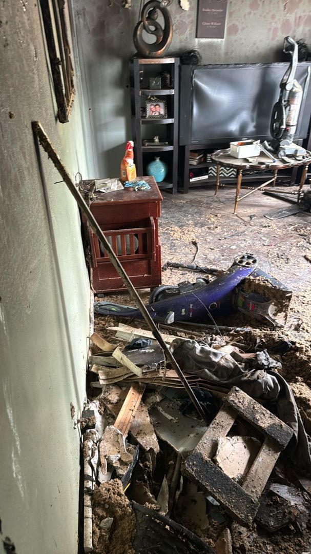 Smoke damage in Springfield living room before restoration