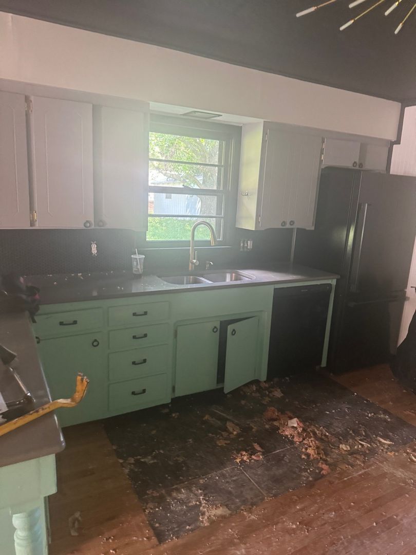 Fire damage in Springfield kitchen with debris covering floor