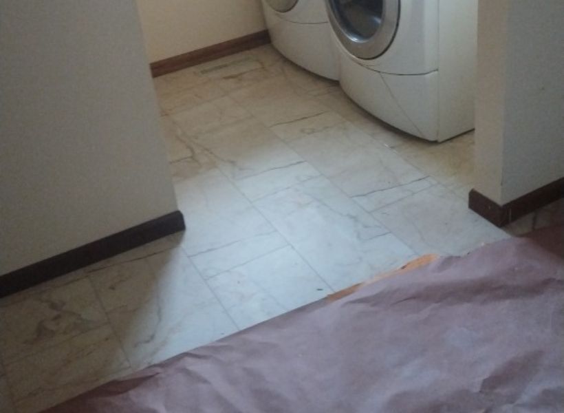 water-damaged laundry room