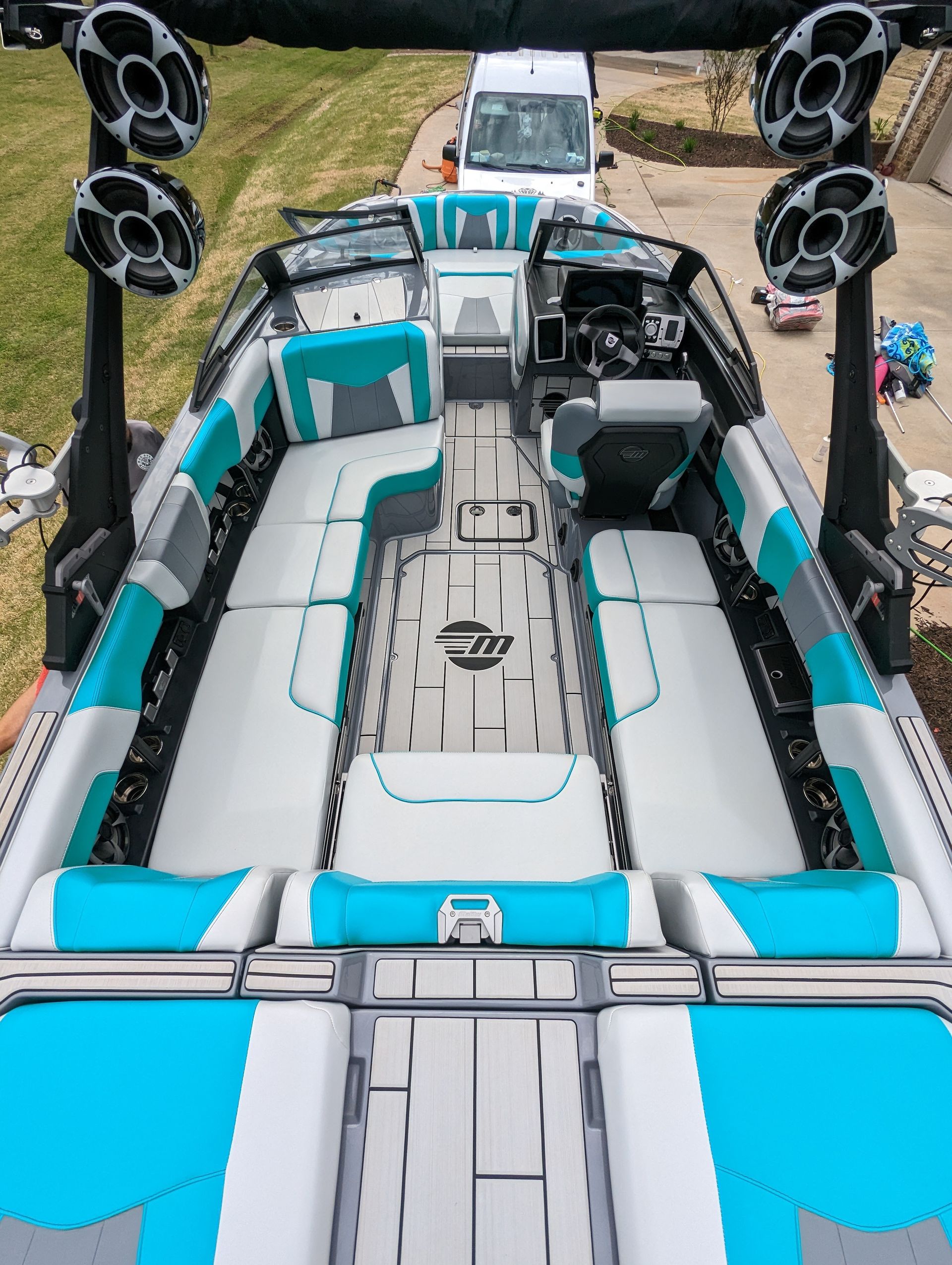 The inside of a boat with a lot of speakers on it.