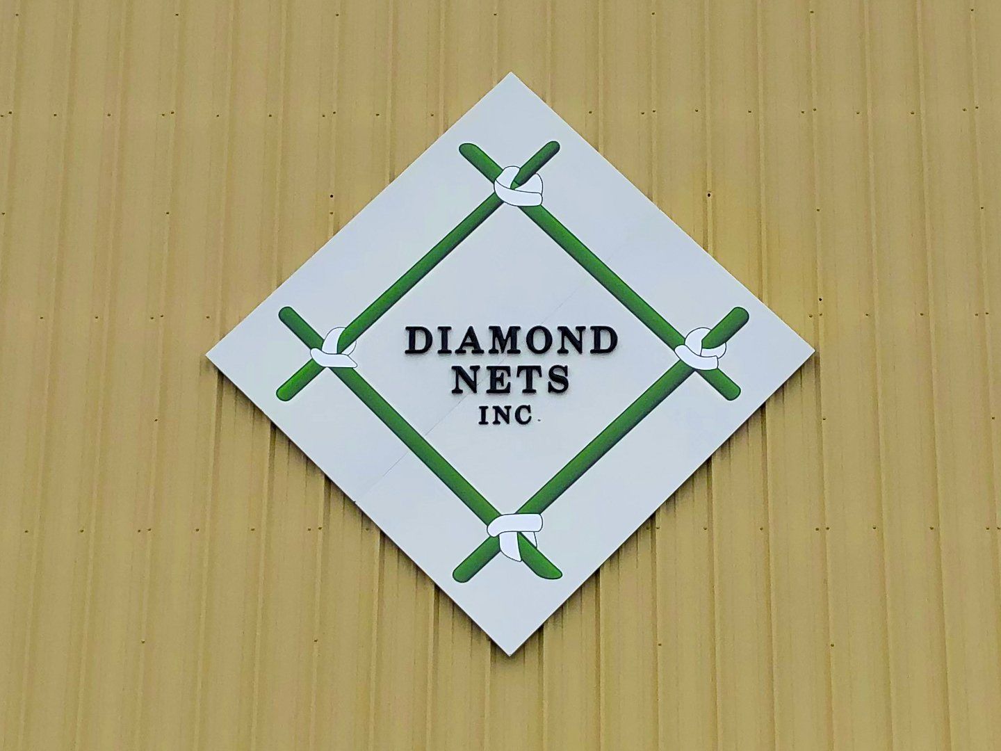 diamond nets building sign