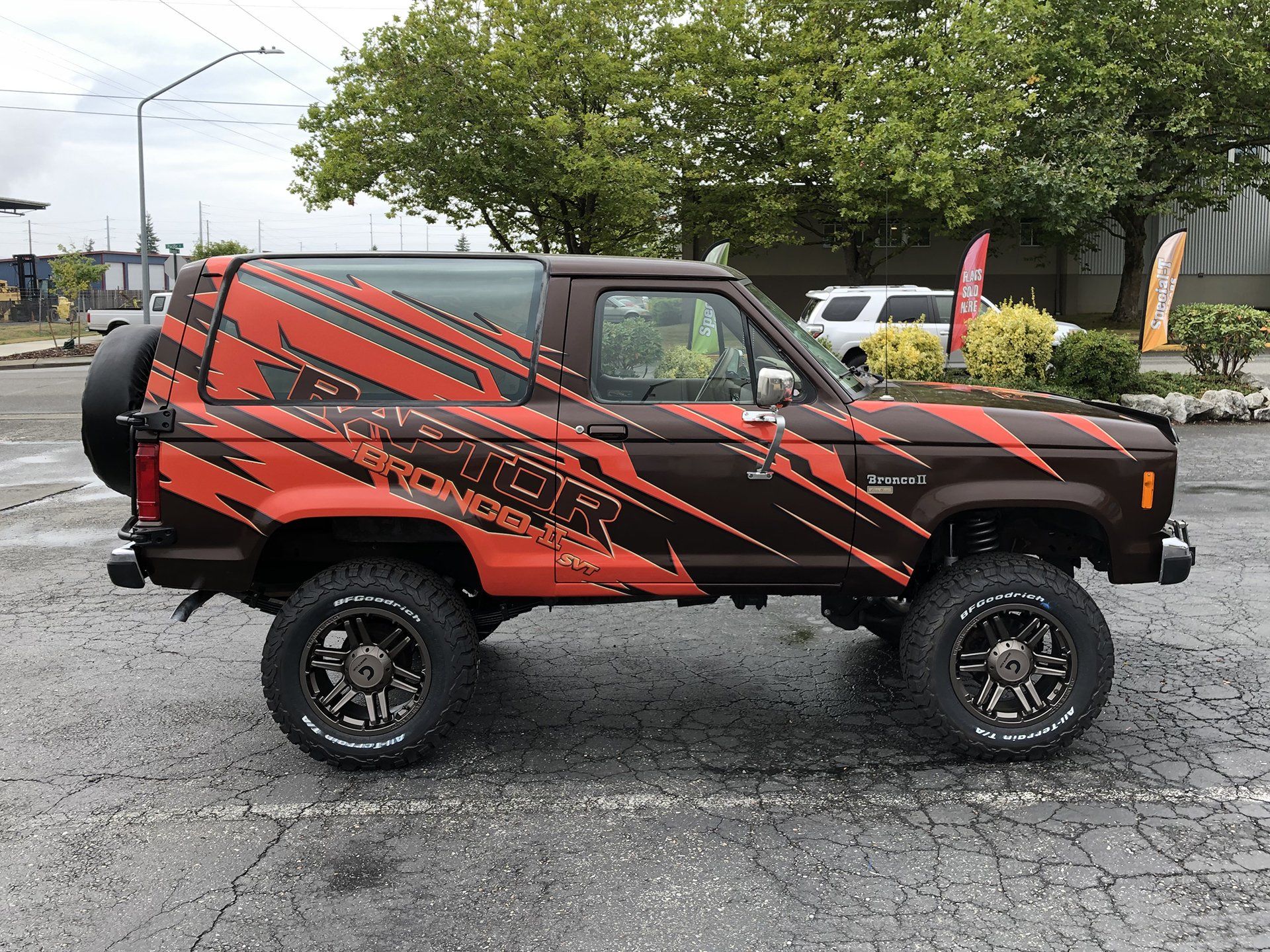 vehicle graphic design red and black