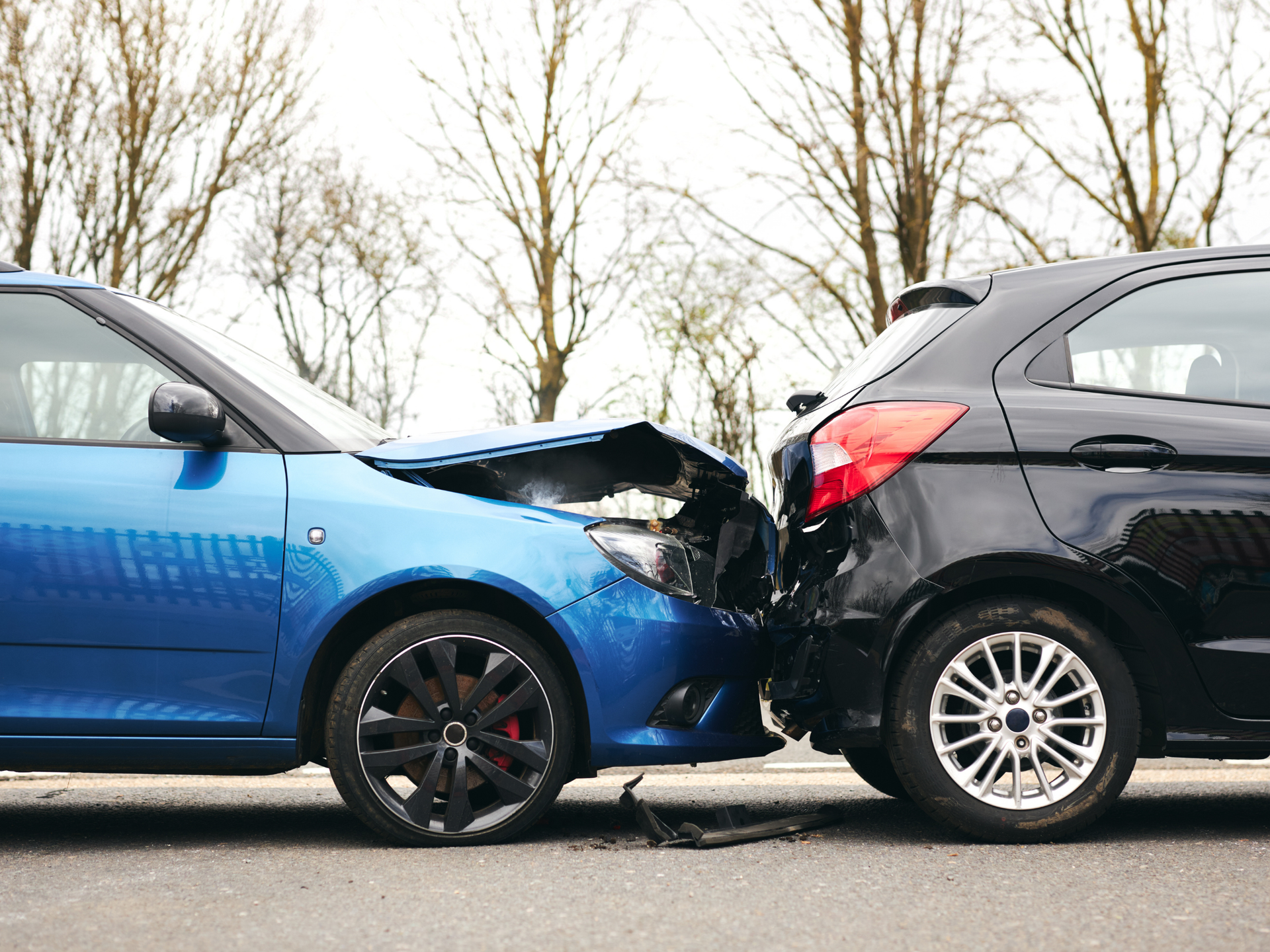 Two vehicles with front-end damage after a collision, highlighting the need for coverage from a home and auto insurance broker service in San Tan Valley, AZ
