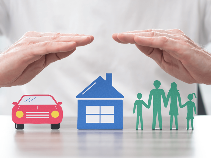 Hands hovering over icons of a car, house, and family, representing bundled coverage from a home and auto insurance broker service in San Tan Valley, AZ