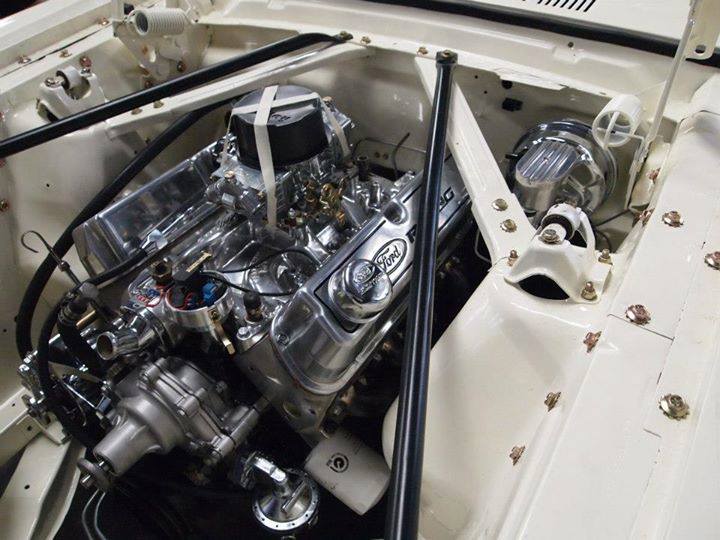custom engine inside white car